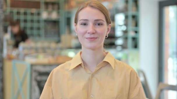 Portrait of Young Woman Smiling at Camera — Stock Video