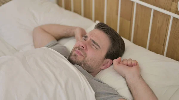 Young Man Wake Up from the Bed — Stock Photo, Image