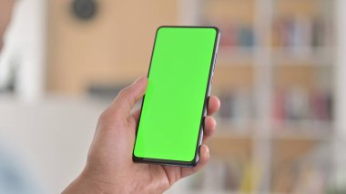 Chroma Key, Rear View of Young African American Man Using Smartphone