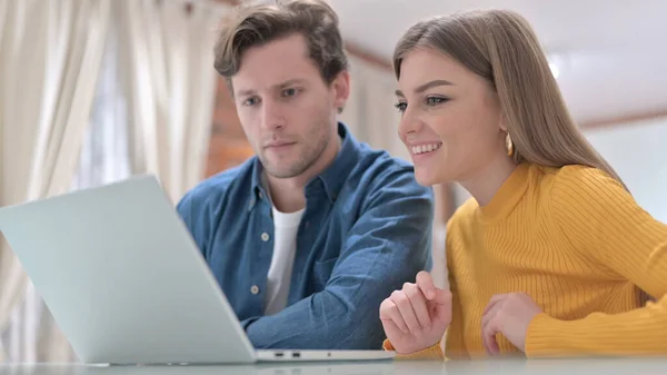 Cheerful Young Designer Colleagues working on Laptop — Stock Photo, Image