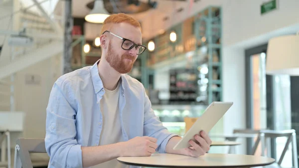 Redhead Man, Failure on Tablet in Cafe