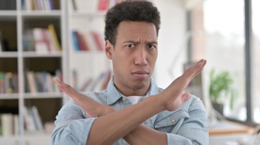 No, Young African American Man Crossing Arms in Rejection