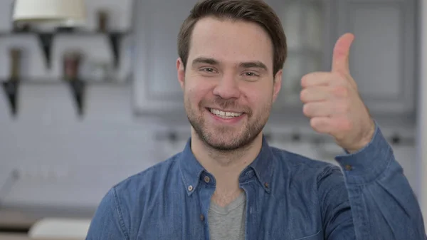 Portrait of Young Man showing Thumbs Up — Stok Foto