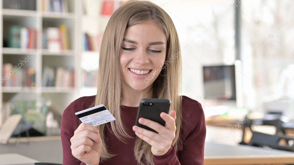 Online Payment on Smartphone by Happy Woman