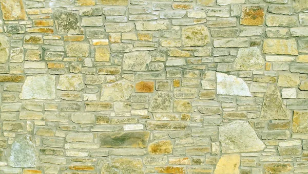 A pattern of flat stones. Grey stone wall background. Surface st — Stock Photo, Image