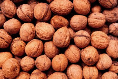 Soyut ceviz deseni. Doğal ceviz arkaplanı. Doğal yiyecek cevizleri.