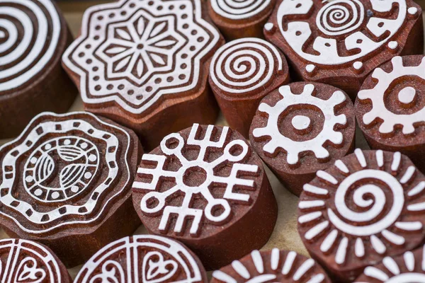 carved wooden stamps of various designs