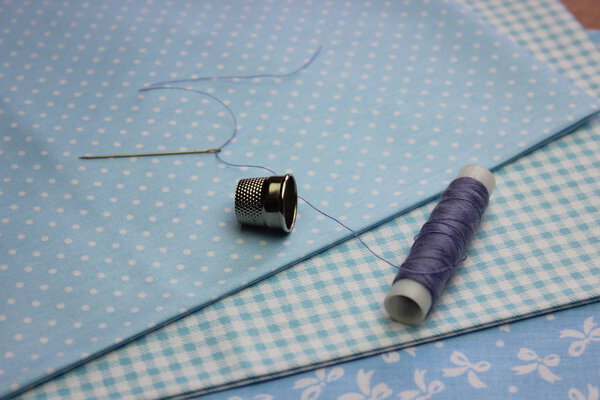 Cloth with thread coils