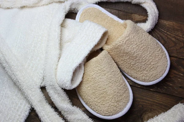 Terry bathrobe and bath slippers — Stock Photo, Image