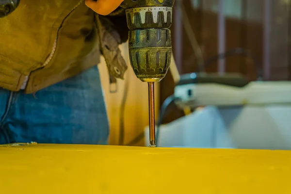 A screwdriver inserted into the screw head. — Stock Photo, Image