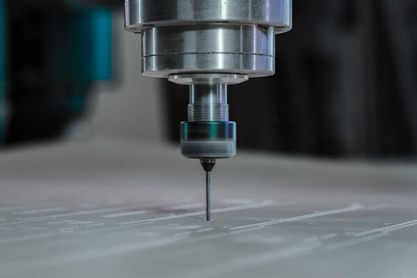 Spindle with a milling cutter inserted into the collet. cnc machine