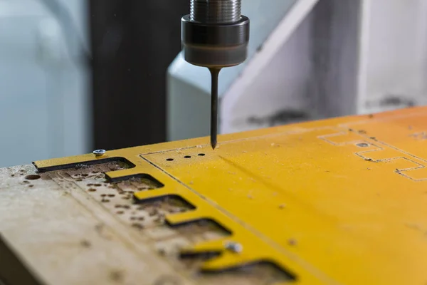 Work on the CNC machine.