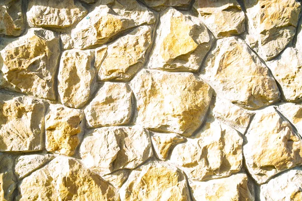 Объемный фон из дикого камня. Текстура декоративного облицовочного камня . — стоковое фото