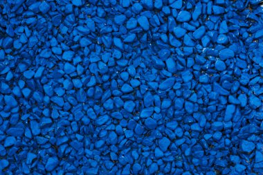 Arka plan renkli küçük çakıl. Arka plan mavi.