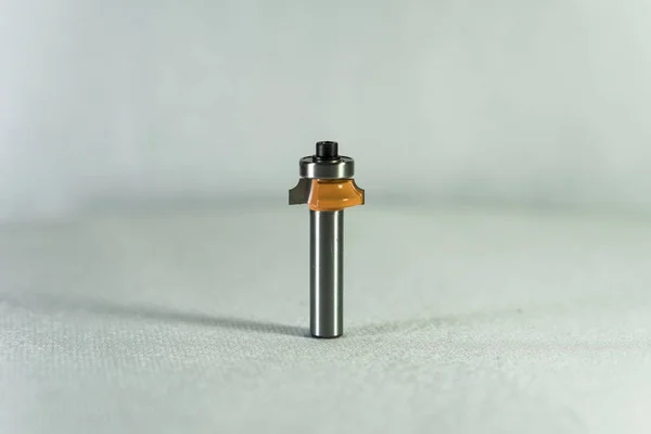 The cutter. Milling cutter and router bit. Orange corner round bit for wood and plastic.