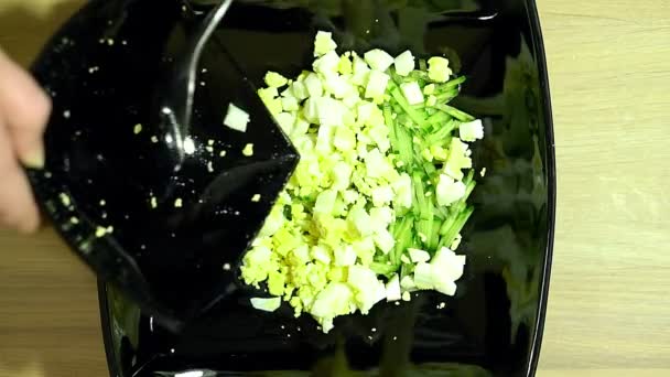 Preparation of salad with crab sticks. Ingredients. Cabbage, egg, corn, crab sticks. — Stock Footage Preparation of salad with crab sticks. Ingredients. Cabbage, egg, corn, crab sticks. Stock Footage