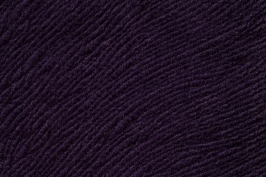 Yumuşak Tekstil malzemesinden koyu mor arka plan. Doğal dokulu kumaş.