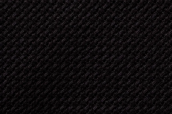 Czarny tkanina tło zbliżenie. Struktura tkaniny makra — Zdjęcie stockowe