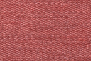 Bir tekstil malzemesinden açık kırmızı renkli. Doğal dokulu kumaş. Zemin.