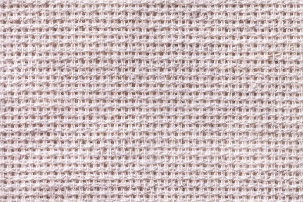 Tkaniny białe tło zbliżenie. Struktura tkaniny makra — Zdjęcie stockowe