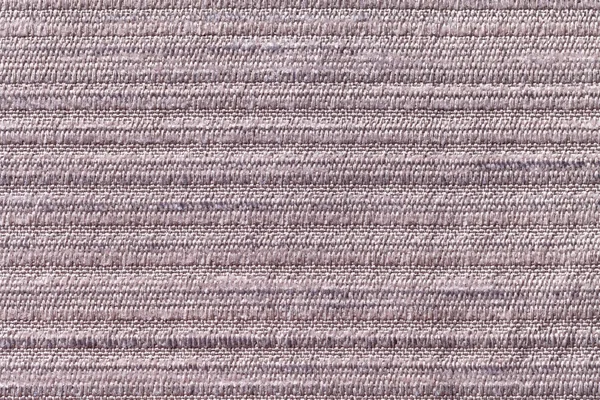 Brun bakgrund av en stickad textilmaterial. Tyg med en randig struktur närbild. — Stockfoto