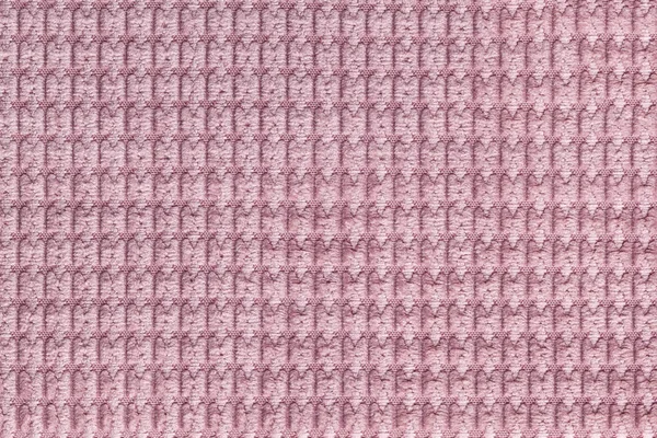Rosa bakgrund från mjukt ulliga tyget på nära håll. Konsistens av textilier makro — Stockfoto