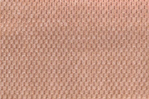 Lekkie brązowe tło z miękkiej tkaniny kędzierzawy zbliżenie. Tekstura włókienniczych makro — Zdjęcie stockowe