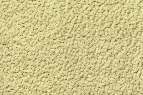 Gula fluffiga bakgrunden av ulliga, mjuk trasa. Konsistens av textil närbild — Stockfoto