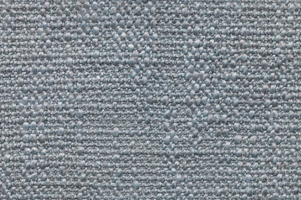 Blå stickad ull bakgrund med ett mönster av ulliga, mjuk trasa. Konsistens av textil närbild. — Stockfoto
