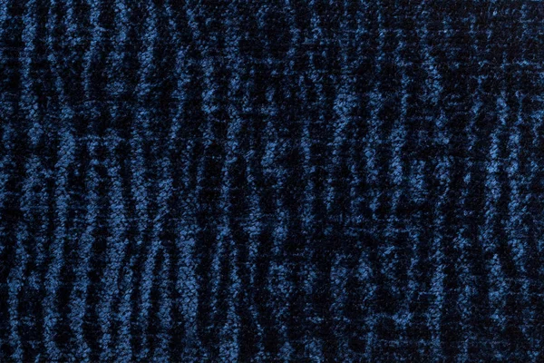 Dunkelblauer, flauschiger Hintergrund aus weichem, wolligem Stoff. Textur von textilen Nahaufnahmen — Stockfoto