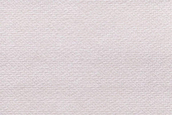 Witte pluizige achtergrond van zachte, wollige doek. Textuur van textiel closeup — Stockfoto