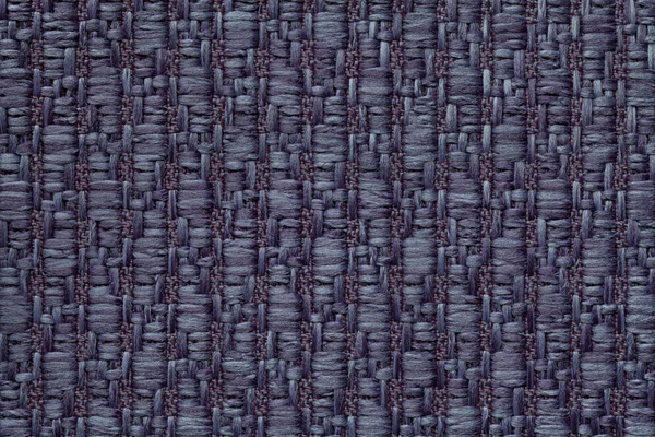 Donker blauwe gebreide wollen achtergrond met een patroon van zachte, wollige doek. Textuur van textiel closeup. — Stockfoto