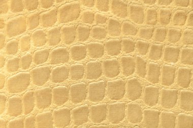 Yumuşak döşemelik Tekstil malzemesinden, closeup koyu sarı arka plan. Kumaş deseni ile