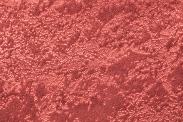 Fondo rojo oscuro de un material textil de tapicería suave, primer plano . — Foto de Stock