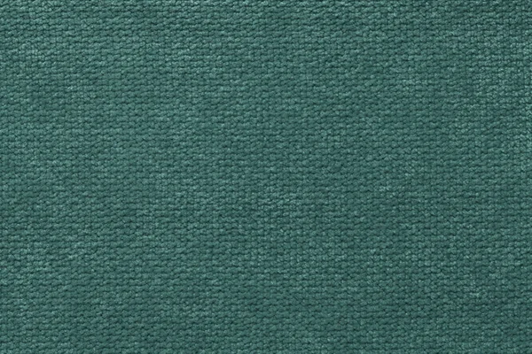 Dunkelgrüner, flauschiger Hintergrund aus weichem, wolligem Tuch. Textur aus leichtem Windeltextil, Nahaufnahme. — Stockfoto