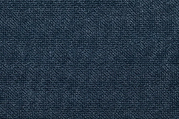 Dunkelblauer, flauschiger Hintergrund aus weichem, wolligem Stoff. Textur aus leichtem Windeltextil, Nahaufnahme. — Stockfoto