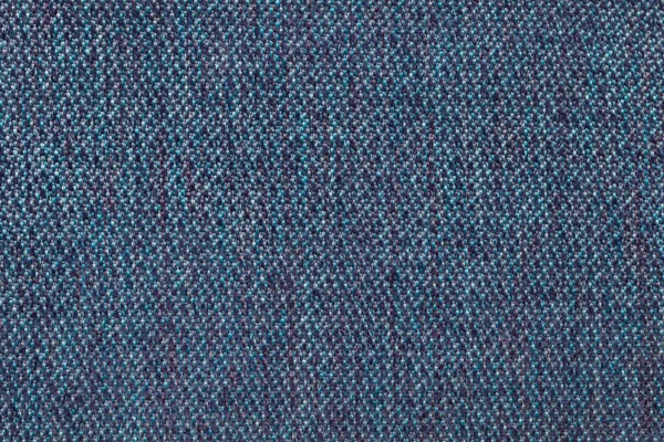 Navy blue background from woolen texture textile, closeup. Structure of the wicker fabric macro.