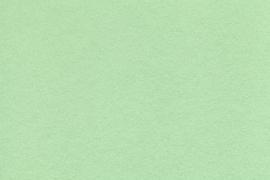 Eski ışık yeşil kağıt closeup doku. Yoğun bir karton yapısını. Nane arka plan.