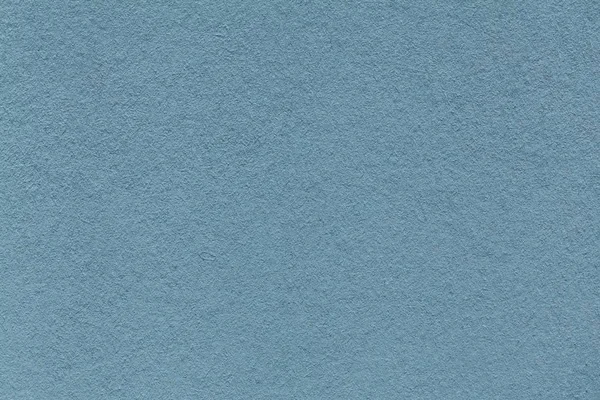 Texture del vecchio primo piano di carta blu. Struttura di un cartone denso. Lo sfondo azzurro . — Foto Stock