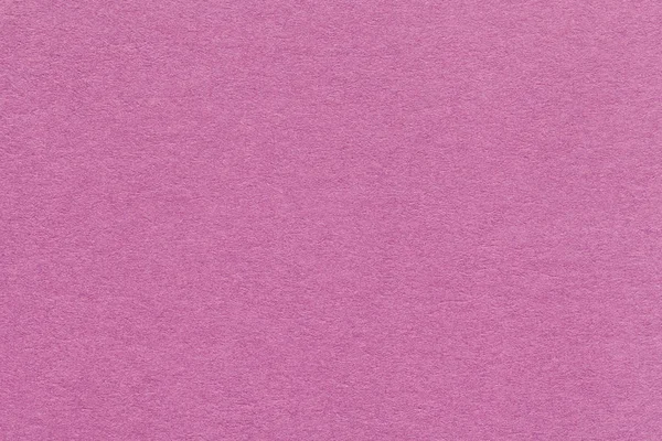 Texture of old dark pink paper closeup. Structure of a dense cardboard. The rose background. — Stock Photo, Image