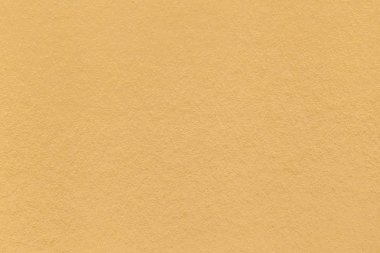 Eski hafif sarı kağıt closeup doku. Yoğun bir karton yapısını. Altın arka plan