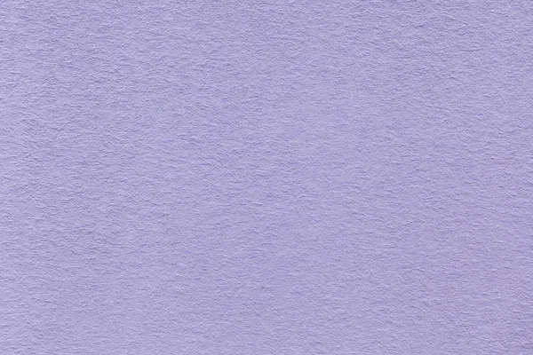 Konsistens av gamla ljus violett papper närbild. Struktur av en tät kartong. Lavendel bakgrunden. — Stockfoto