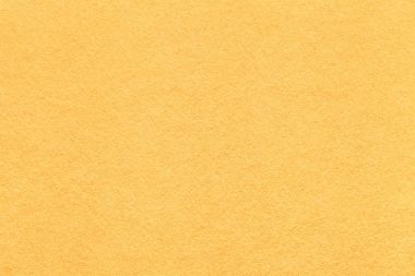 Eski hafif sarı kağıt arka plan, closeup doku. Yoğun limon karton yapısını