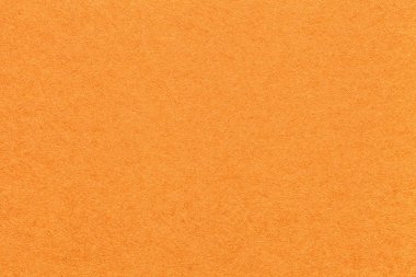 Eski parlak turuncu kağıt arka plan, closeup doku. Yoğun havuç karton yapısını