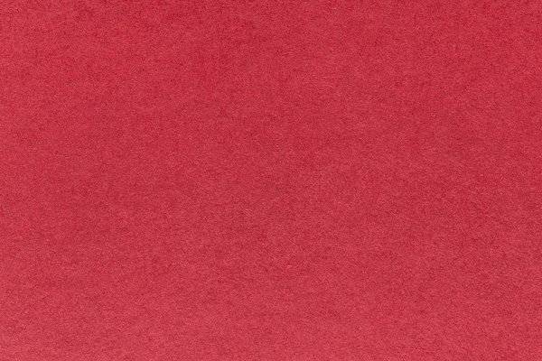 Текстура старого темно-червоного паперового фону, крупним планом. Структура щільного винного картону . — стокове фото