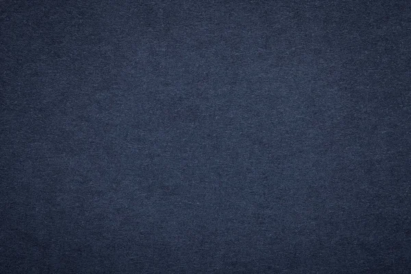 Eski lacivert kağıt arka plan, closeup doku. Yoğun karanlık denim karton yapısını