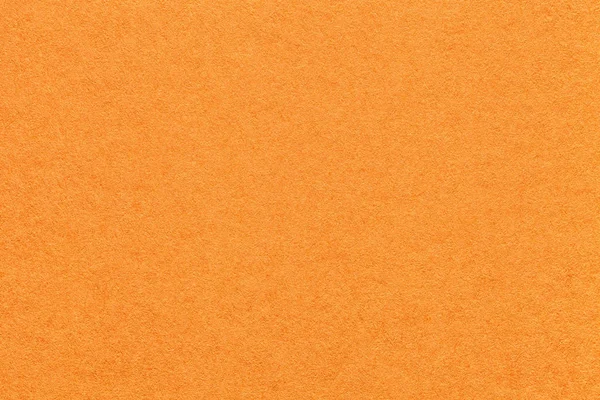 Textura de fundo de papel laranja brilhante velho, close-up. Estrutura de papelão de cenoura densa — Fotografia de Stock