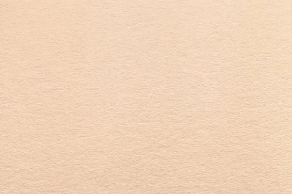 Textura de fondo de papel beige claro viejo, primer plano. Estructura de cartón de arena densa — Foto de Stock