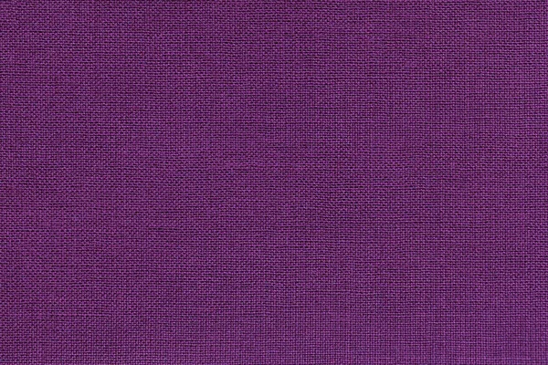 Темно-фиолетовый фон из текстильного материала с плетеным рисунком, крупным планом . — стоковое фото