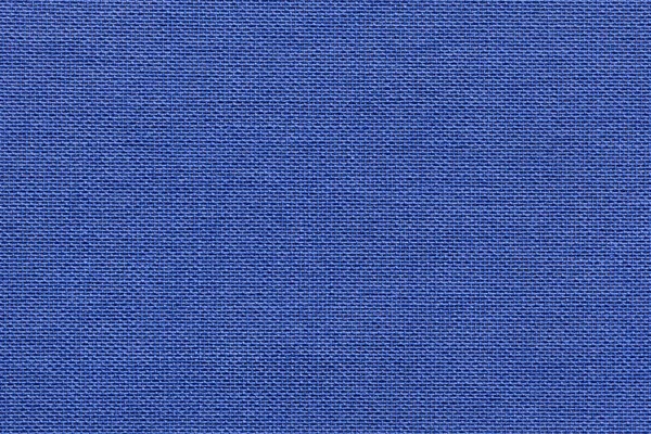 Navy blue background from a textile material with wicker pattern, closeup.